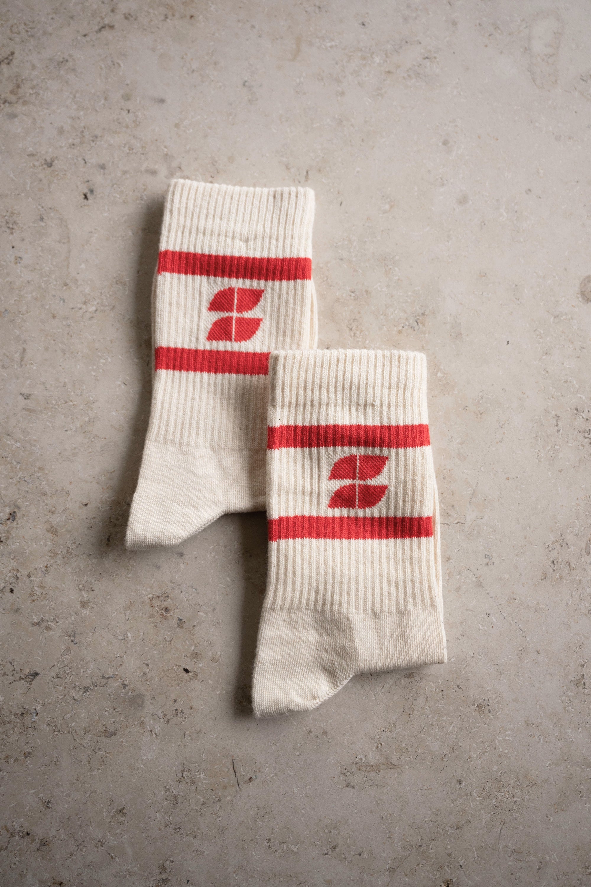 logo uni socks | poppy-red