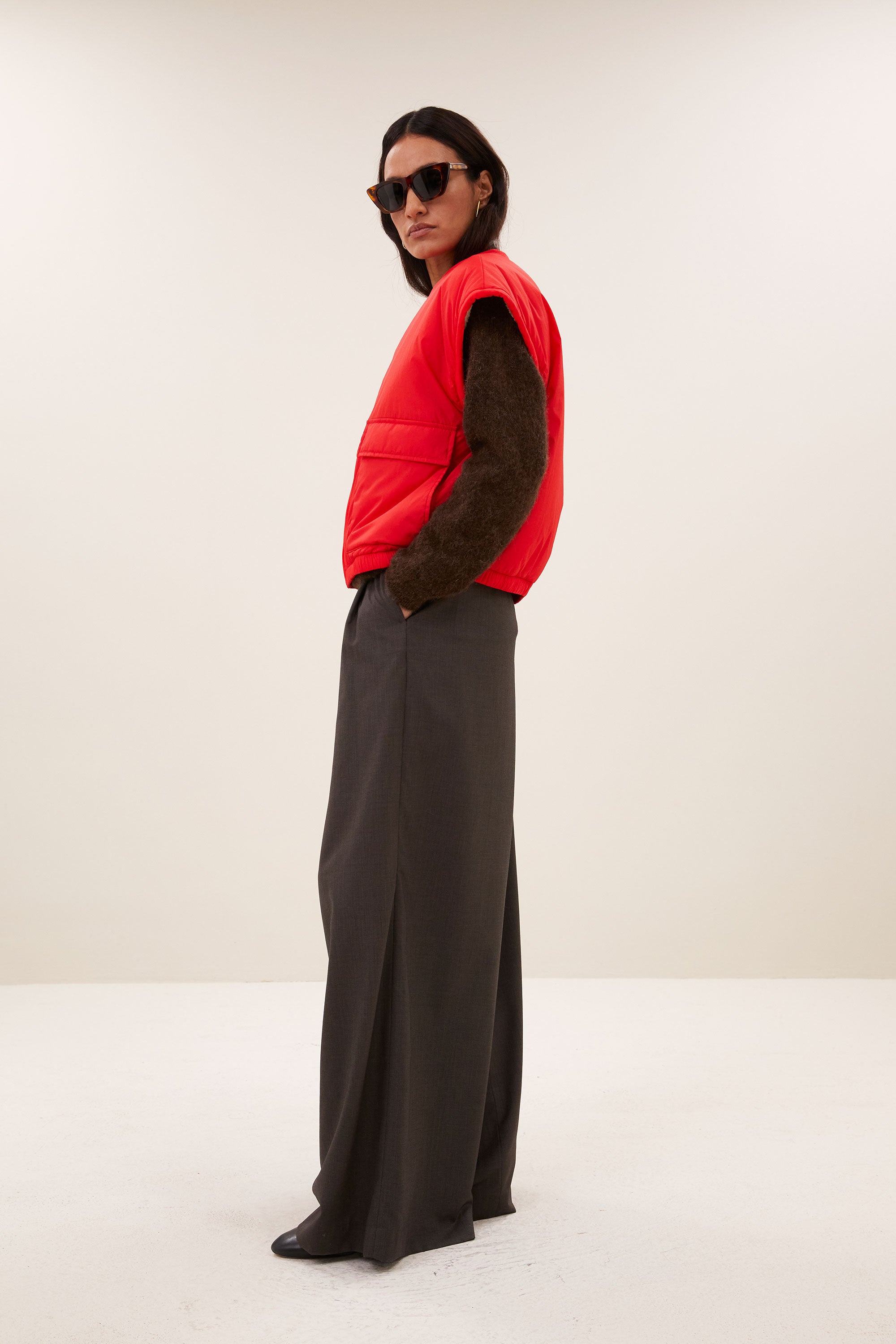 gio sleeveless jacket | poppy red
