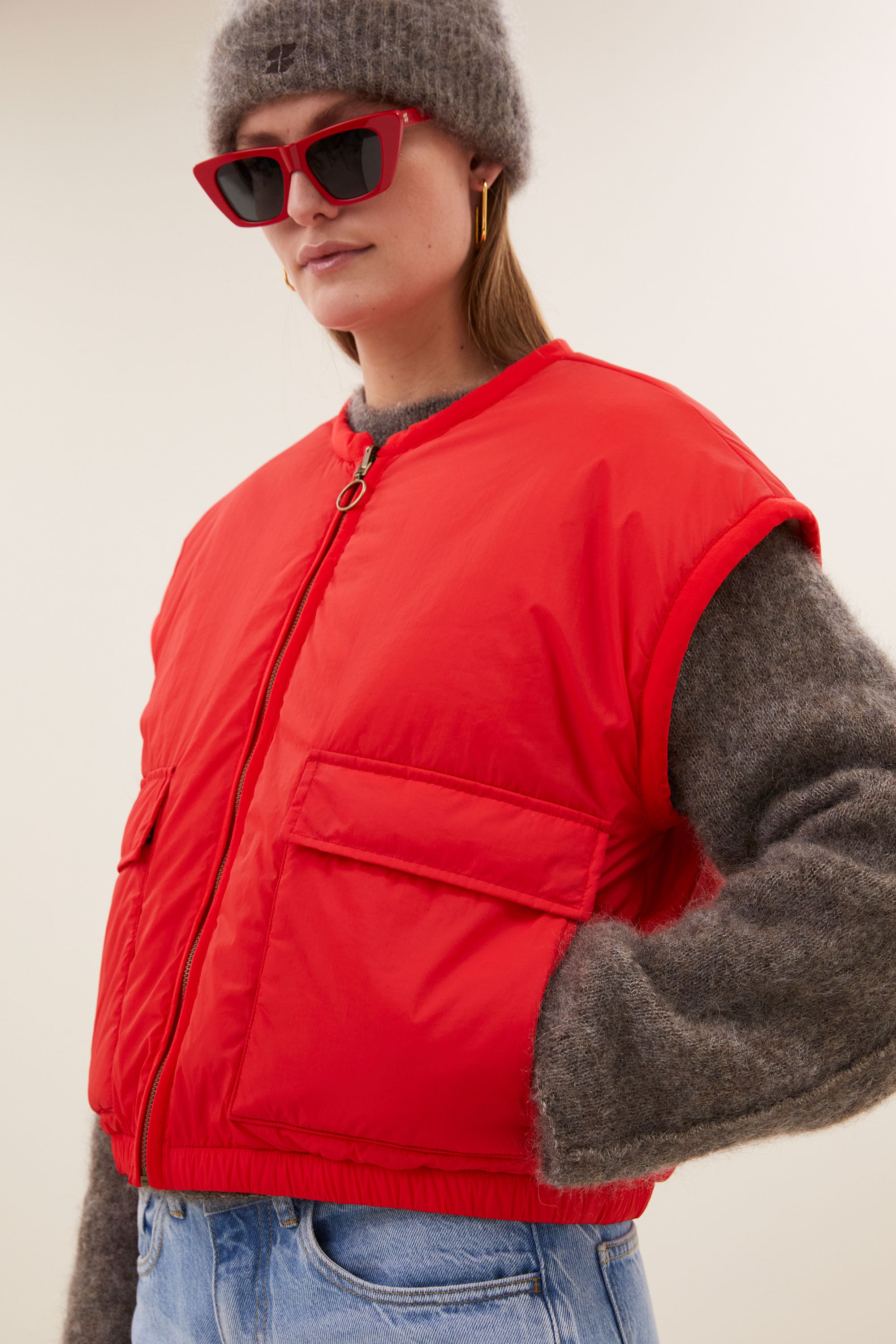 gio sleeveless jacket | poppy red