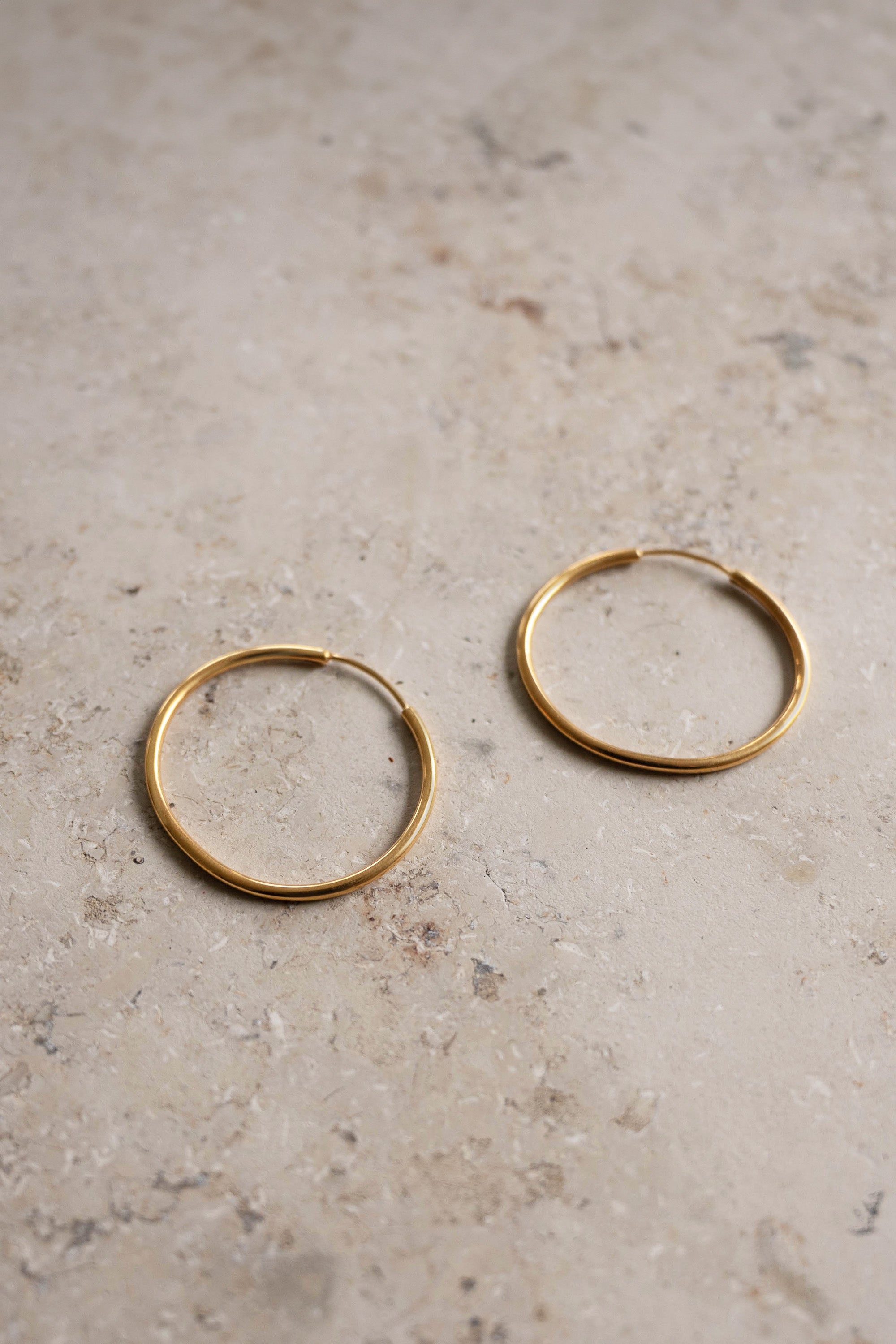 pd round earring M | gold