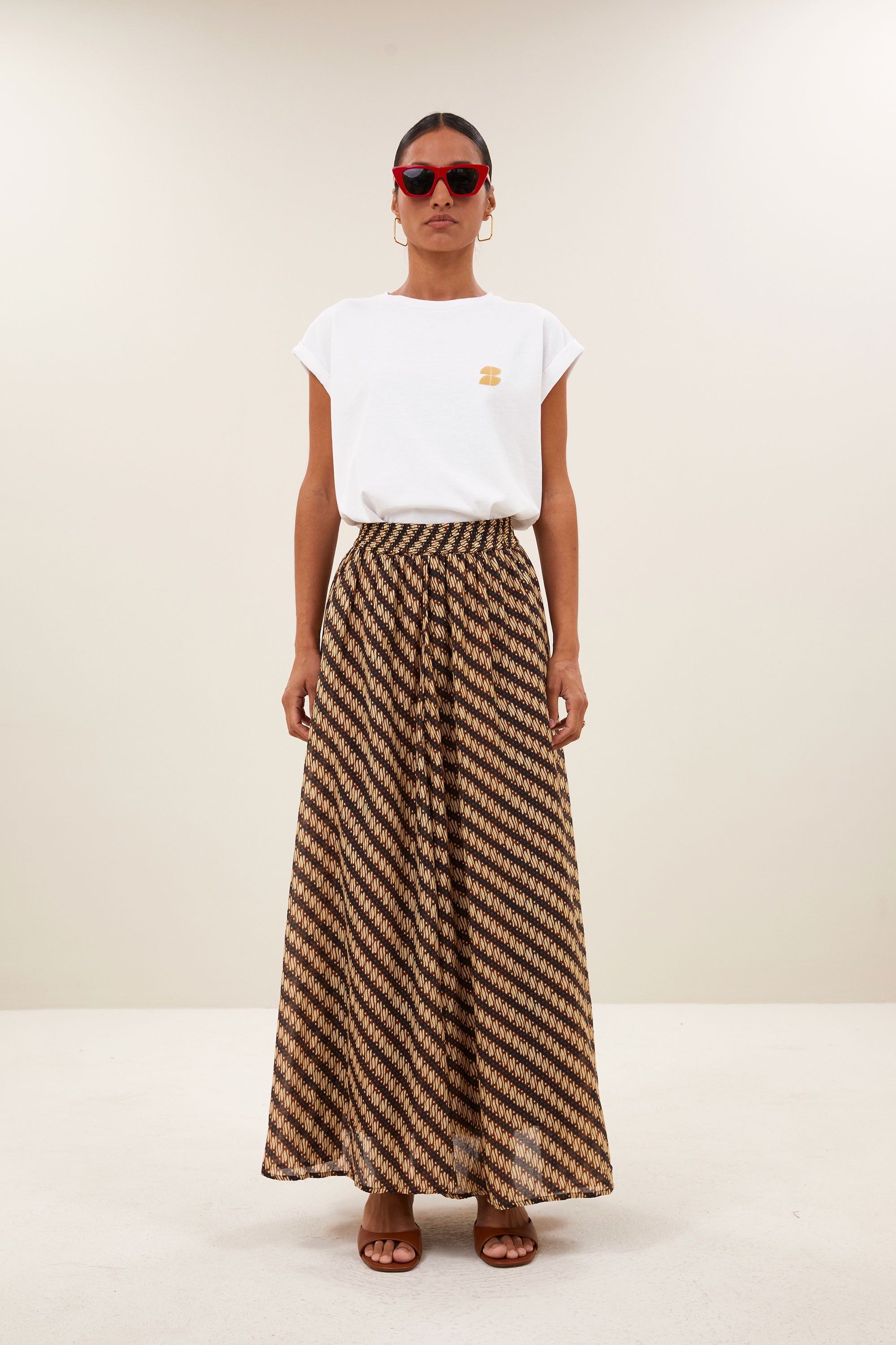 tobi flame logo top | bright white