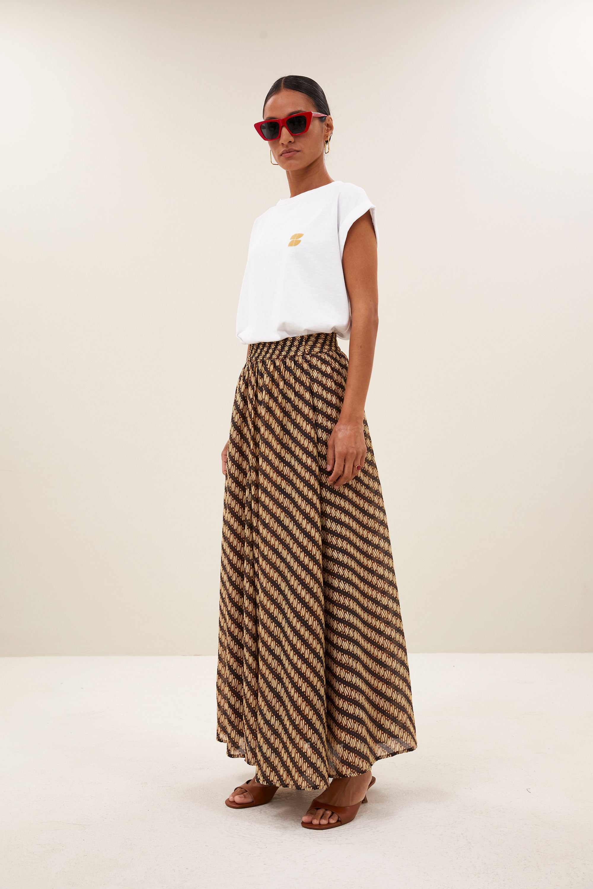 tobi flame logo top | bright white