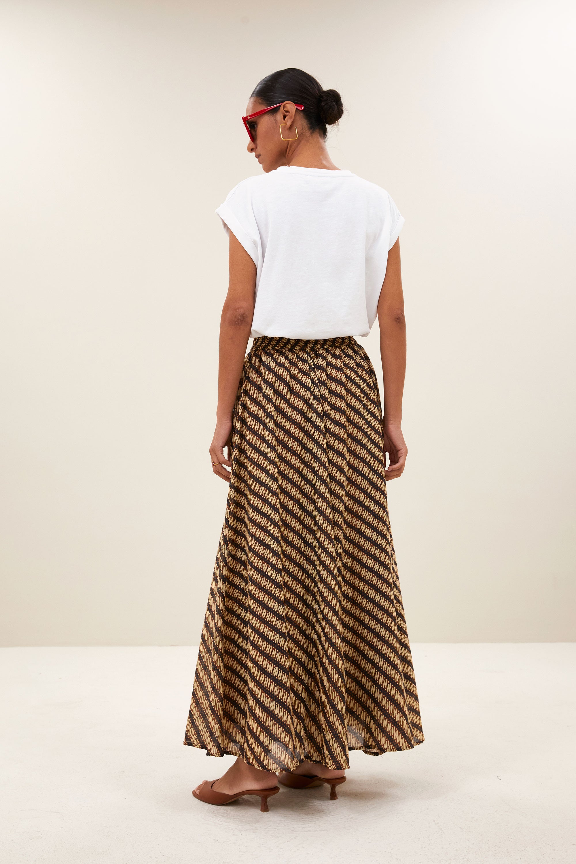 tobi flame logo top | bright white